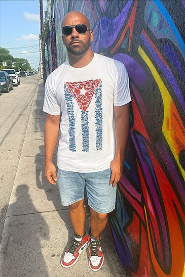 Cuban-man-on-the-streets-of-Wynwood-wearing-the-Cuban-Flag-of-fishes-tshirt-by-Made-In-Dade