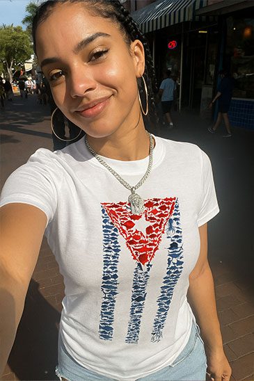 Sexy-Cuban-Girl-walking-Calle-Ocho-with-Cuban-Flag-made-of-Fishes-shirt-by-Made-In-Dade