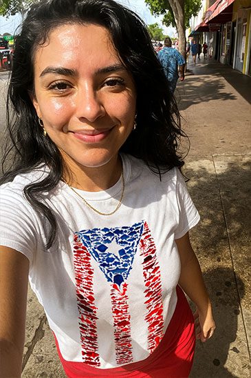 woman-wearing-a-tshirt-showing-puerto-rico-flag-made-from-fishes-by-Made-In-Dade