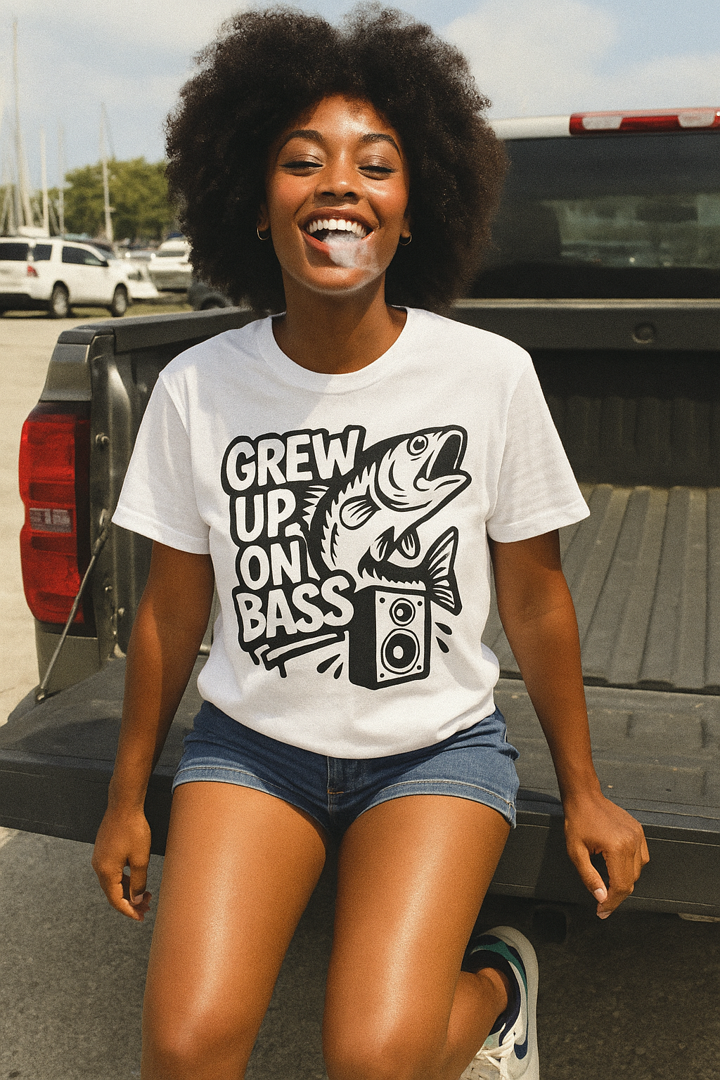 cute black woman sitting on Silverado tailgate wearing Gre Up On Bass tshirt by Made In Dade