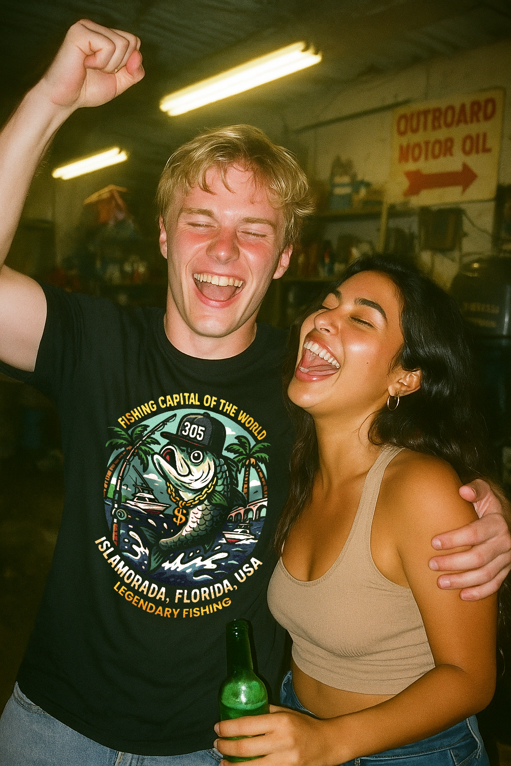 Cuban young lady with her mechanic boyfriend partying at boat yard, the mechanic is wearing a black Islamorada Fishing Capital tshirt by Made In Dade